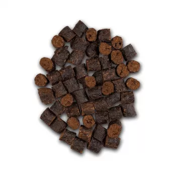 UNISZKI Crunchy Rabbit su mėtomis ir dilgėlėmis 80 g – traškūs skanėstai šunims su triušiena