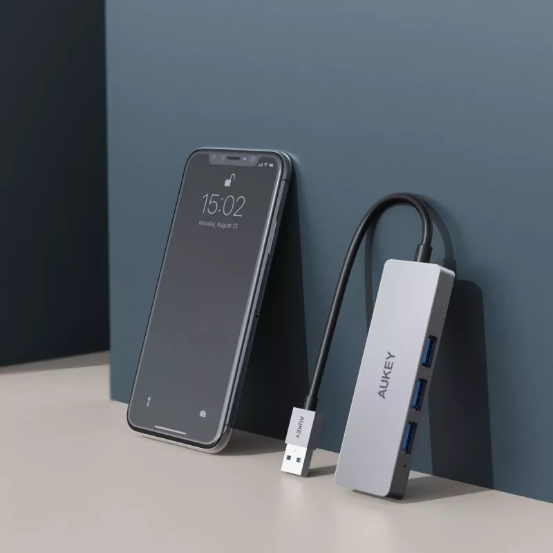 USB šakotuvas Aukey CB-H36 — 4 prievadai USB 3.2 Gen 1 Type-A, pagrindinis USB 2.0, 5000 Mbit/s, aliuminis sidabrinis