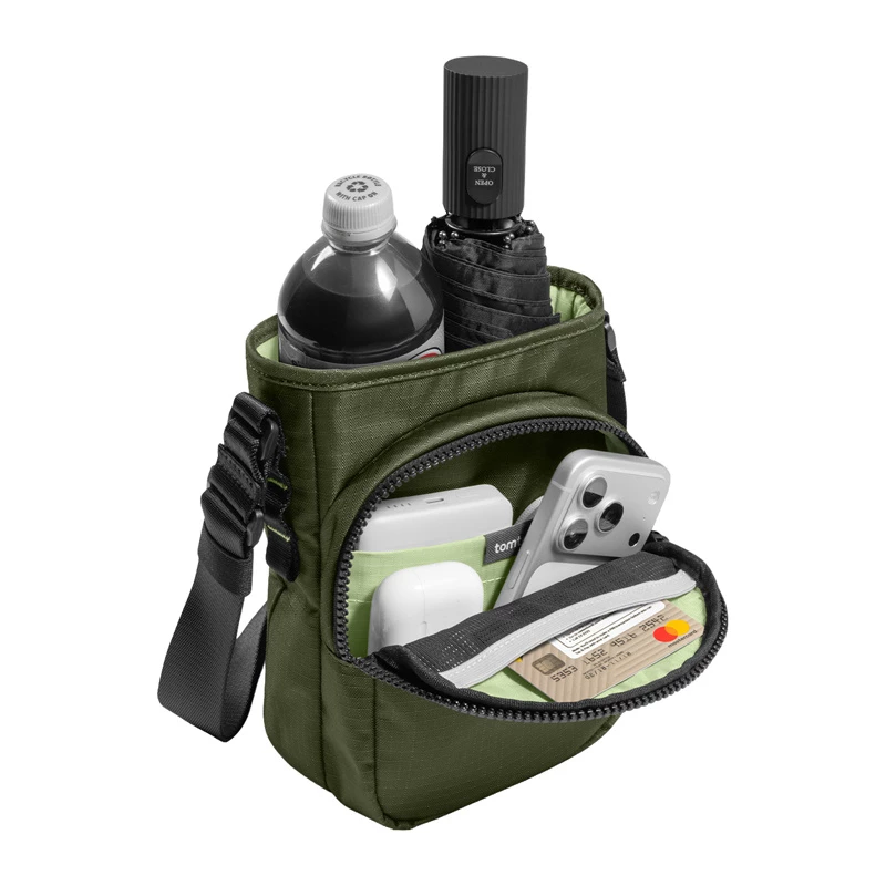 Tomtoc GameOn-G50 Switch 2 JoyCarry Sling Bag žalias – nešiojimo dėklas, skirtas Nintendo Switch OLED ir Switch 2