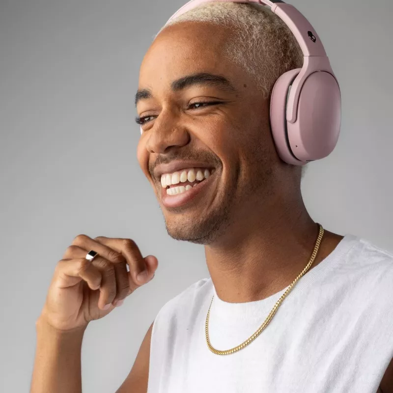 Skullcandy Crusher 540 Active ausinės ant ausų, švelniai rožinės spalvos