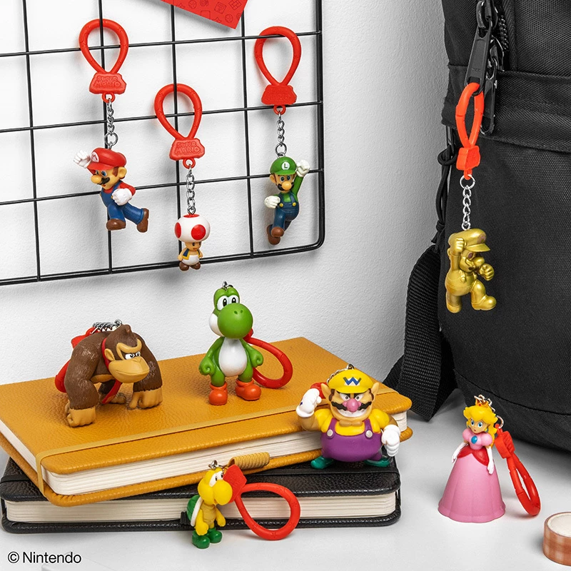 Backpack Buddies raktų pakabukų rinkinys Paladone Super Mario, CDU, 24 vnt. – įvairūs veikėjai, kolekcionuojami aksesuarai