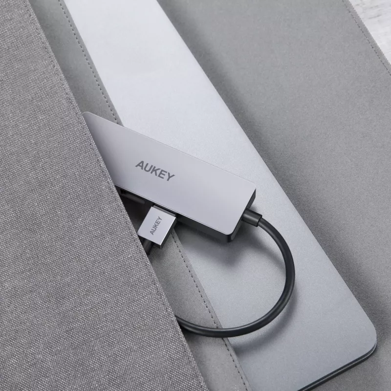 USB šakotuvas Aukey CB-H36 — 4 prievadai USB 3.2 Gen 1 Type-A, pagrindinis USB 2.0, 5000 Mbit/s, aliuminis sidabrinis