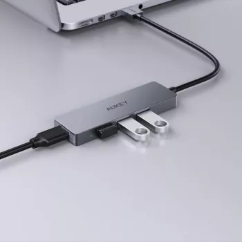 USB šakotuvas Aukey CB-H36 — 4 prievadai USB 3.2 Gen 1 Type-A, pagrindinis USB 2.0, 5000 Mbit/s, aliuminis sidabrinis