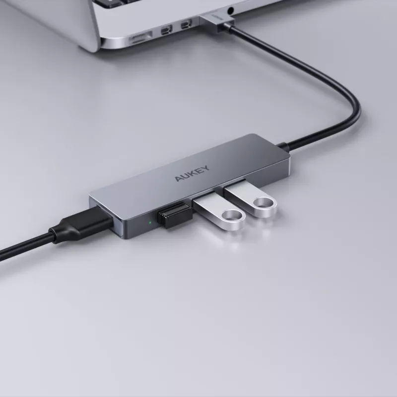 USB šakotuvas Aukey CB-H36 — 4 prievadai USB 3.2 Gen 1 Type-A, pagrindinis USB 2.0, 5000 Mbit/s, aliuminis sidabrinis