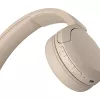Sony WH-CH520 Belaidės ausinės ant galvos, skambučiams/muzikai, USB Type-C, Bluetooth, įkrovimo stovelis, kreminė