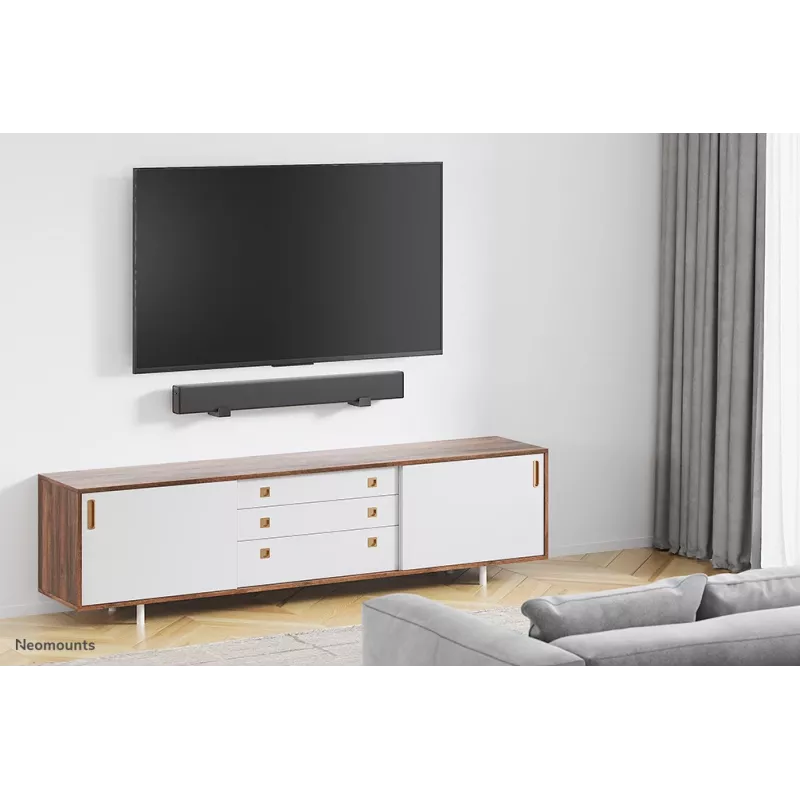 Neomounts AWL29-550BL1 laikiklis videobarui / soundbarui ant sienos – universalus, iki 15 kg