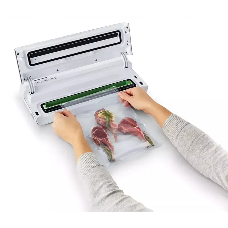 Vakuuminis maisto pakuotuvas FoodSaver VS0100X su sukamuoju valdikliu, komplekte ritinys ir 4 maišeliai, sidabriškai baltas
