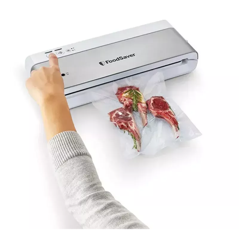 Vakuuminis maisto pakuotuvas FoodSaver VS0100X su sukamuoju valdikliu, komplekte ritinys ir 4 maišeliai, sidabriškai baltas