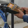 DYMO Rhino 6000+ Pramoninis etikečių spausdintuvas su kietuoju dėklu, 1 vinilo juostos kasetė, 1 nailono juostos kasetė ir įkraunama ličio jonų baterija