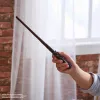 Harry Potter burtų lazdelė su stovu ir liejiniu simboliu, Magiškos būtybės, 12 colių