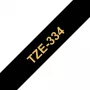 Brother TZe334 laminuota etikečių juosta 12 mm auksinė ant juodos