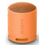 Sony SRS-XB100 - Belaidis Bluetooth garsiakalbis, nešiojamas, atsparus vandeniui ir dulkėms IP67, 16 val. baterija, ekologiškas, lauko ir kelionių, oranžinis