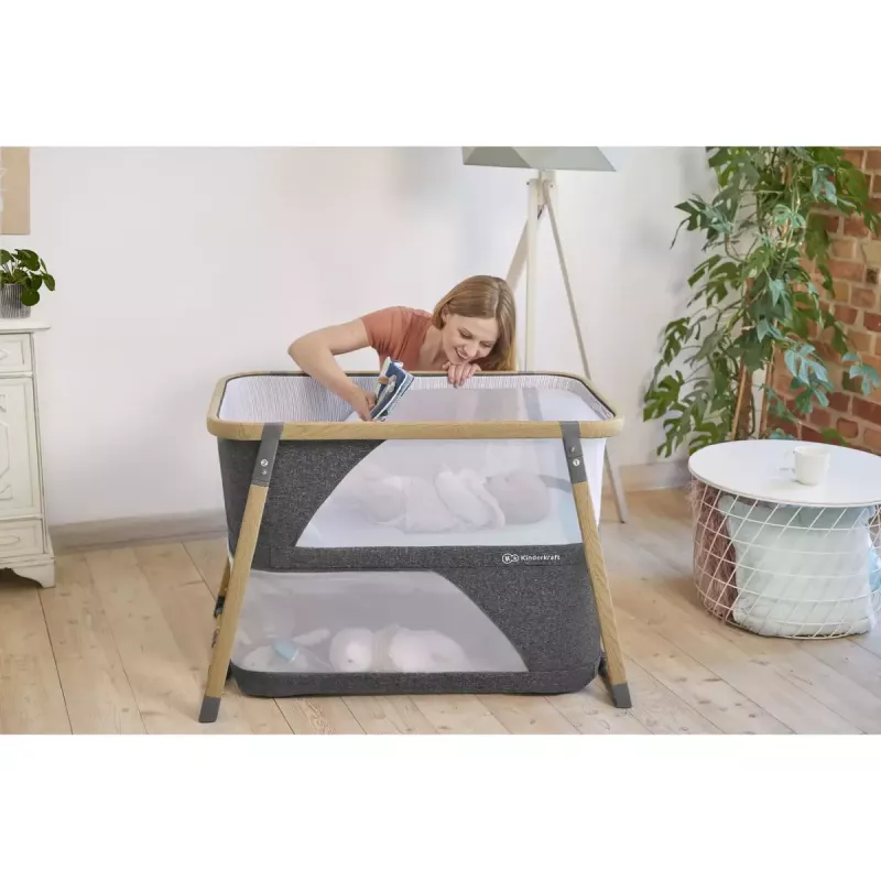 Kinderkraft Sofi pilka kelioninė lovelė, maksimali apkrova 15 kg