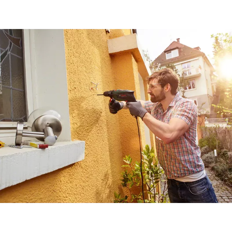 Bosch Universal Impact 800 3000 RPM gręžtuvas su greito užspaudimo griebtuvu 1.7 kg juoda, žalia