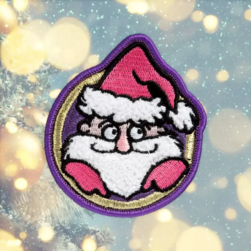 Ženkliukas LAUT MAGMOJI BADGE – Kalėdų Senelio versija, PVC ir silikonas, įvairiaspalvis, 1 vnt.