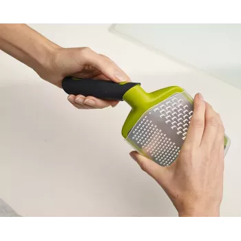 Tarka su sukamuoju rankenėlės mechanizmu Joseph Joseph Twist Grip Green