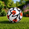 LEAN TOYS Treniruočių futbolo kamuolys žolės aikštei, baltas ir oranžinis, 22 cm, 5 dydis