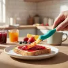 OTOTO Splatypus Slotted Spatula & Turner - juoda su oranžiniais akcentais