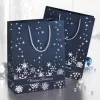 SIGEL GT110 Silver Snowflakes Dovanų maišelių rinkinys, 3 vnt., dengtas popierius, baltos tekstilės virvelės rankenos, metalinis blizgesys, Kalėdoms ir žiemos šventėms, 230 x 180 x 100 mm