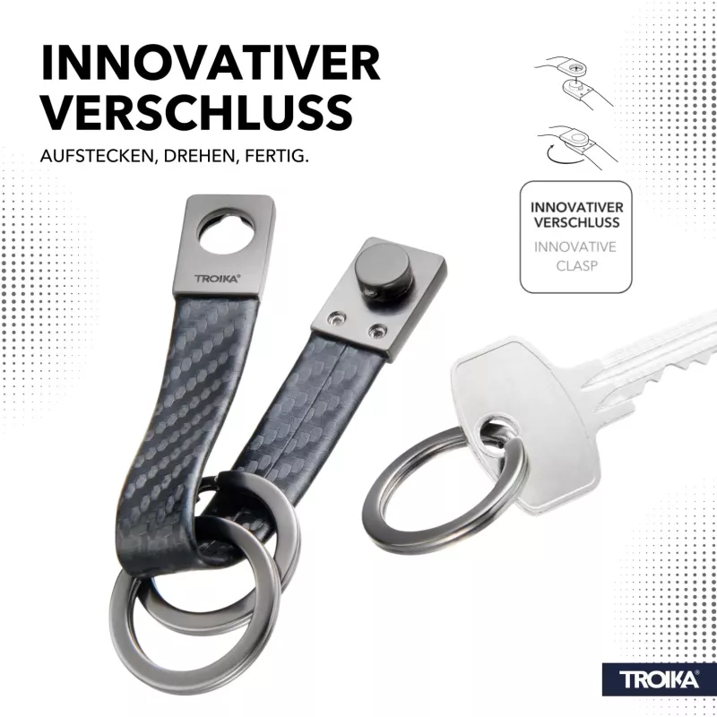 TROIKA TWISTER CARBON raktų pakabukas su traukimo ir sukimo mechanizmu, chromuotas metalas ir anglies pluoštas, 4 skeltukai KRG649/CB