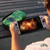 Hyperkin M07541-MTCN kietas dėklas, žalias, įvairiaspalvis, PEVA, skirtas Nintendo Switch Lite, atsparus smūgiams, vandeniui atsparus, nešiojimo krepšys