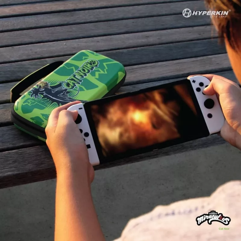 Hyperkin M07541-MTCN kietas dėklas, žalias, įvairiaspalvis, PEVA, skirtas Nintendo Switch Lite, atsparus smūgiams, vandeniui atsparus, nešiojimo krepšys