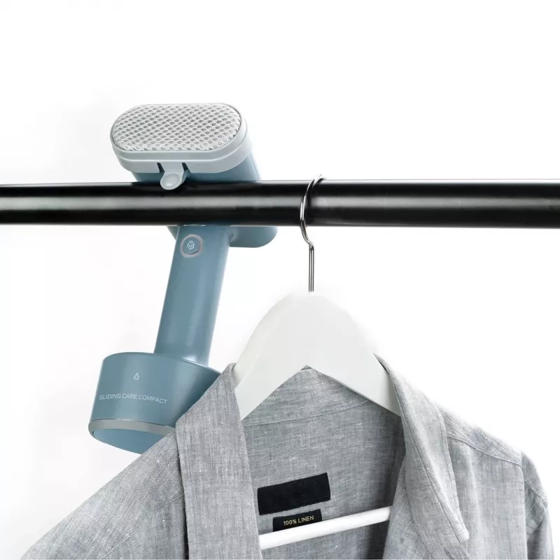 Taurus Sliding Care Compact kelioninis garinis lygintuvas 1600 W, 135 ml, nerūdijančio plieno padas, ciano spalvos