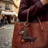 TFO Universal Phone Chain su taksų motyvu, ruda, 150 cm, reguliuojamas crossbody dirželis su tvirtinimo pleistru