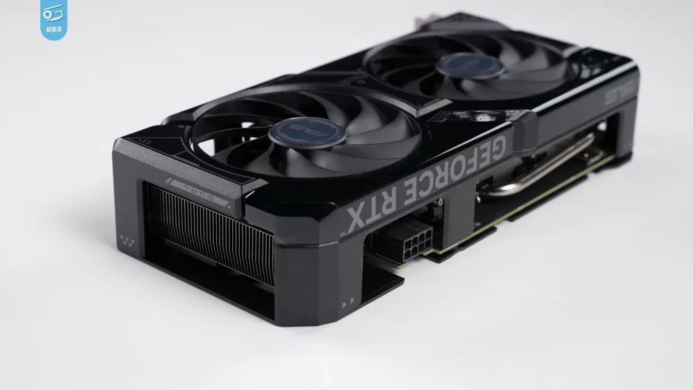 Dual fan graphics card on a white desk